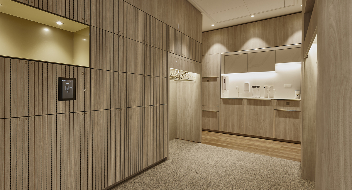 The M+R team chose high-quality wood paneling that looks warm and inviting for the interior of the office building.